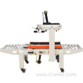 Auto carton sealing machine with side belt conveyor